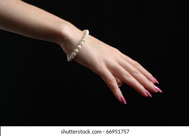 Wrist With A Pearl Bracelet