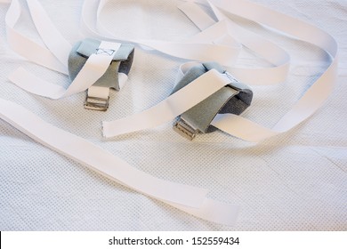 Wrist restraints on a hospital bed underpad - Shutterstock ID 152559434