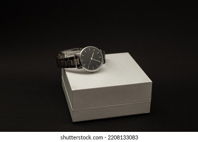 Wristwatch With Metal Strap On Black Background