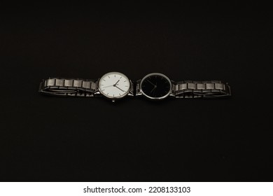 Wristwatch With Metal Strap On Black Background