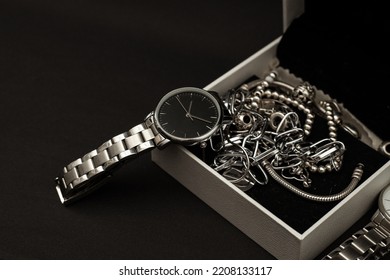 Wristwatch With Metal Strap On Black Background