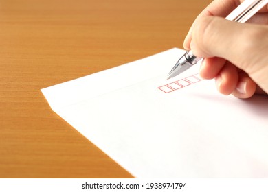 Write the address on the envelope.