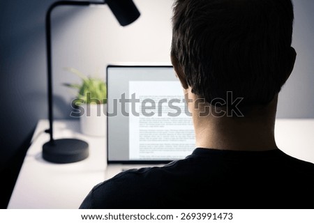 Write blog content with laptop computer. Writer of text, essay, letter, book or report document. Copywriter, editor, freelance journalist or author. Back of man in focus.