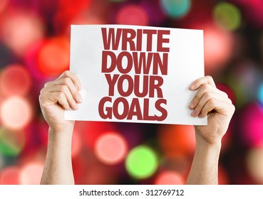 Write Down Your Goals Placard With Bokeh Background