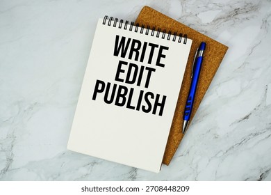 Write Edit Publish text written on notepad with pen on marble background