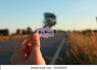 Write Word My Way In Paper On Road Background.