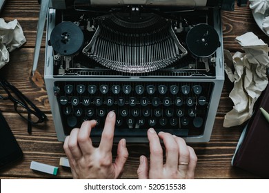 Writer Typing With Retro Writing Machine. View From Above.