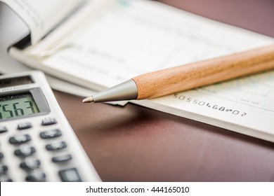 Writing Cheque  With Pen