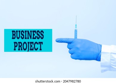 Writing displaying text Business Project. Business overview Planned set of interrelated tasks to be executed over time Chemist Presenting Infection Cure, Doctor Displaying Virus Vaccine - Shutterstock ID 2047982780