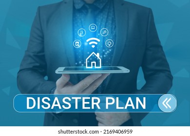 Writing Displaying Text Disaster Plan. Business Approach Respond To Emergency Preparedness Survival And First Aid Kit Man Holding Screen Of Mobile Phone Showing The Futuristic Technology.