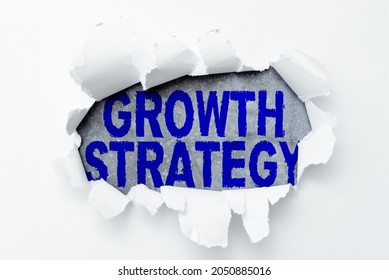Writing displaying text Growth Strategy. Business approach Strategy aimed at winning larger market share in shortterm Thinking New Writing Concepts, Breaking Through Writers Block - Shutterstock ID 2050885016
