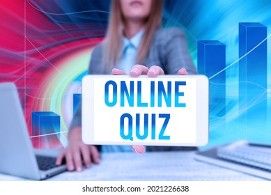 Writing Displaying Text Online Quiz. Word For Game Or A Mind Sport That Are Published On The Internet Business Woman Sitting In Office Holding Mobile Displaying Futuristic Ideas.