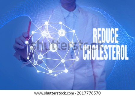 Writing displaying text Reduce Cholesterol. Internet Concept lessen the intake of saturated fats in the diet Lady In Uniform Holding Tablet In Hand Virtually Typing Futuristic Tech.