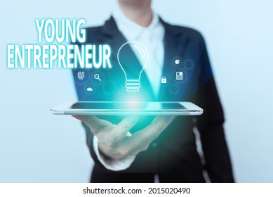 Writing Displaying Text Young Entrepreneur. Business Overview Someone That Started Their Own Business At Young Age Lady In Suit Presenting Mobile Device With Futuristic Interface Tech.