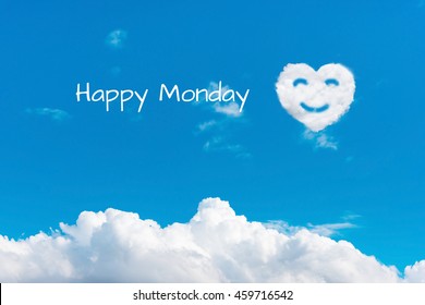 Writing Happy Monday On Blue Sky With Clouds