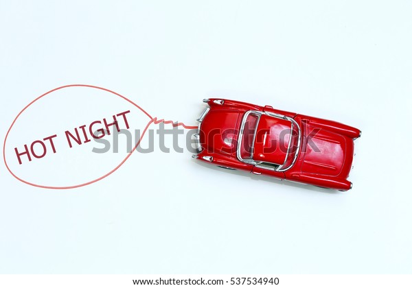 writing Hot Night red toy car with talk bubble\
on white background