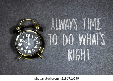 Writing note always time to do what's right with Alarm clock showing seven o'clock  - Shutterstock ID 2191716859