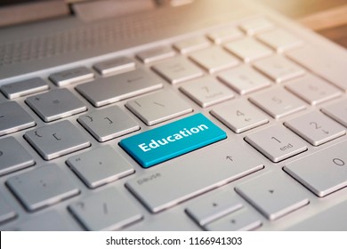 Writing note showing Education. Business photo showcasing Teaching of students by implementation of latest technology written on Blue Key Button on grey Keyboard with copy space
