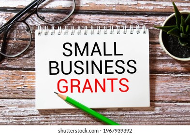 Writing Note Shows The Text Small Business Grants