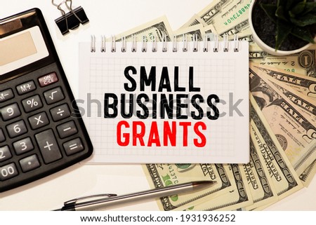 Writing note shows the text VA Small Business Grants.
