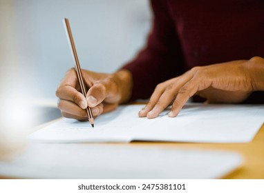 Writing, notebook and hands of person in library for university education, scholarship course or project research. Growth, studying and college student with notes, pencil and planning for exam.