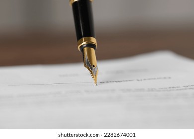 Writing on document with fountain pen, closeup. Notary contract - Shutterstock ID 2282674001