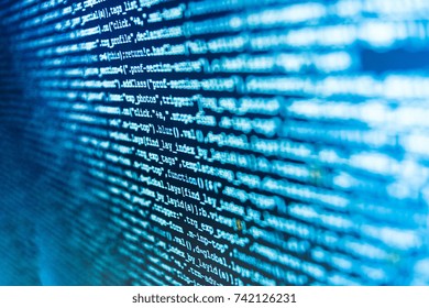 Writing programming functions on laptop. Big data and Internet of things trend. Modern tech. Project managers work new idea. Javascript functions, variables, objects. Desktop PC monitor photo. 
