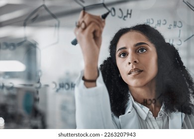 Writing, science and chemistry with black woman in laboratory for medicine, pharmacy and healthcare. Research, analytics and planning with expert solving on glass board for idea, study and data - Powered by Shutterstock