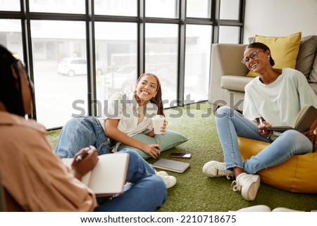 Writing, studying and collaboration student friends in university lounge for a group project, teamwork and planning schedule. Young women relax with coffee and brainstorming ideas and time management
