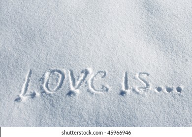 Writing Text LOVE IS On The Snow