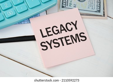 Writing text showing Legacy Systems. Business concept for Upgrade SOA Application written on sticky note paper on wooden background with pen, marker.
