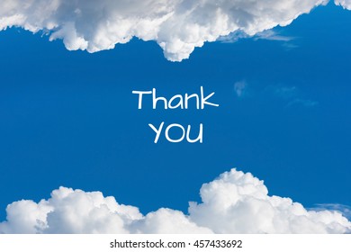 Writing Thank You On Blue Sky With Clouds