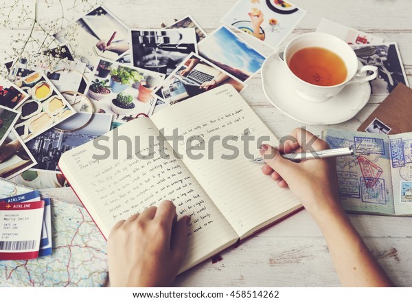 Writing Travel Diary\
Memories Photos Concept