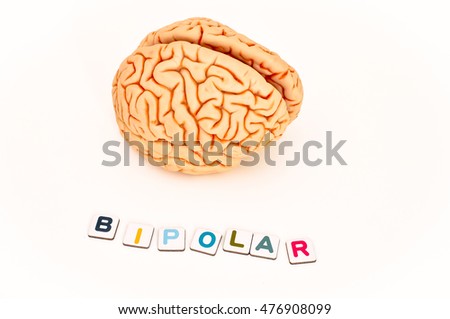 The written BIPOLAR with colored pieces with brain model on white background