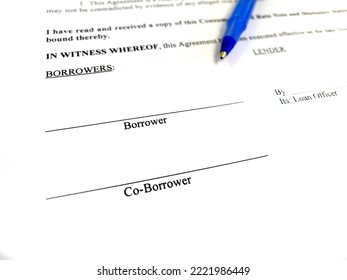 Written Contract For Loan Agreement Document Allowing Individual Or Couple To Borrow Money From Lender Blue Pen