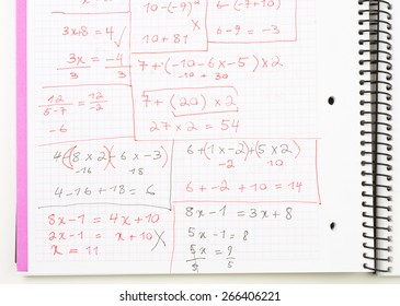 Written Equations/Math Problems on a Notebook 