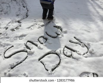 “Snow Day” Written In Fresh Snow.