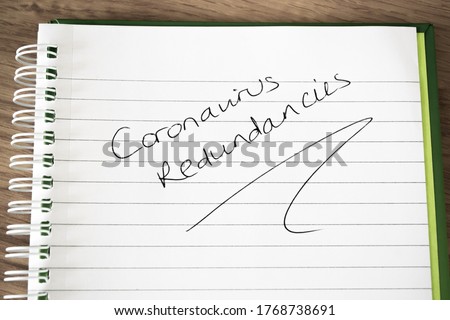 ‘Coronavirus redundancies’ written on lined paper