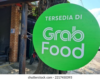 Written Sign Providing Grab Food Facilities At A Food Shop In Surabaya, Indonesia On October 22, 2023