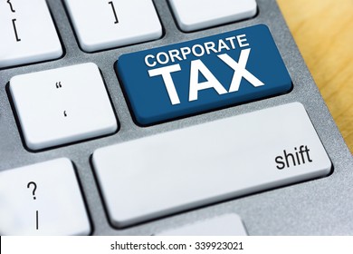 Written Word Corporate Tax On Blue Keyboard Button