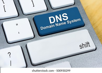 Written Word DNS Domain Name System On Blue Keyboard Button. Internet Protocol Concept