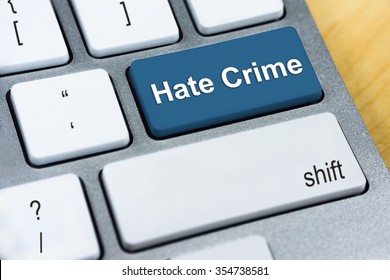 Written Word Hate Crime On Red Keyboard Button. Online Protection And Internet Security Concept.