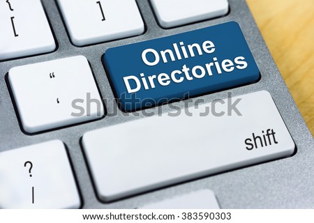 Written word Online Directories on blue keyboard button.