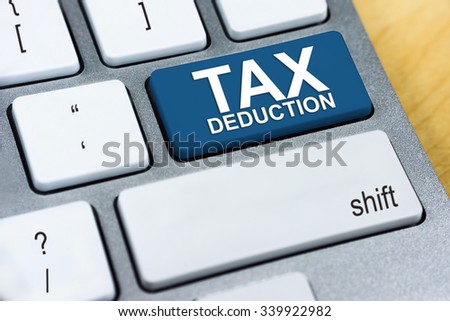 Written word Tax Deduction on blue keyboard button