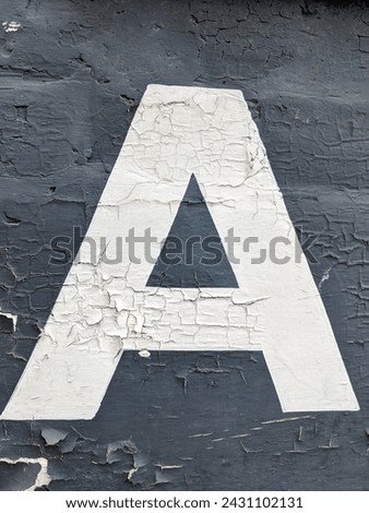 A Written Wording in Distressed State Typography Found Number Letter