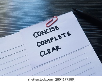 The writting concise, complete, clear on table background. 