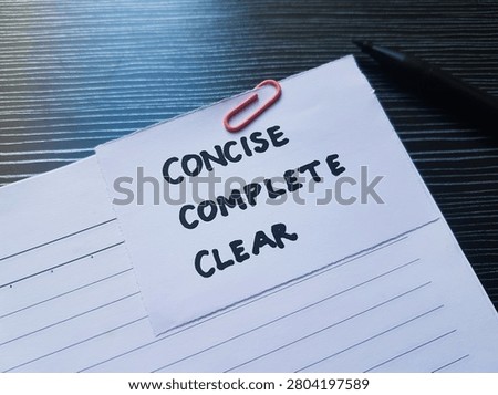 The writting concise, complete, clear on table background. 
