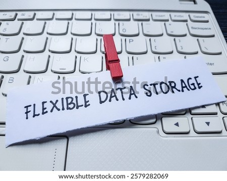 The writting flexible data storage on laptop keyboard background.