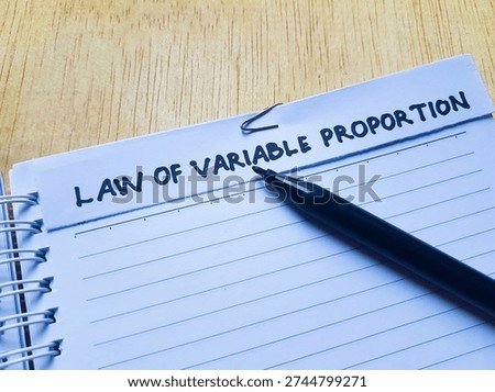 The writting law of variable proportion on table background. 