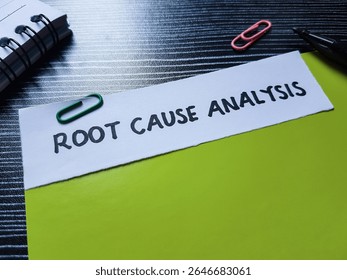 The writting root cause analysis on table background.